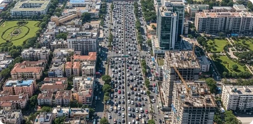 Aerial view of dense multi-lane highway traffic in an Indian metro city