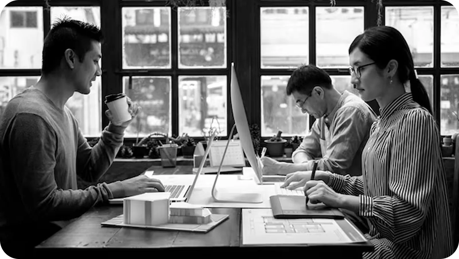 Bharat Self Drive team collaborating in the office