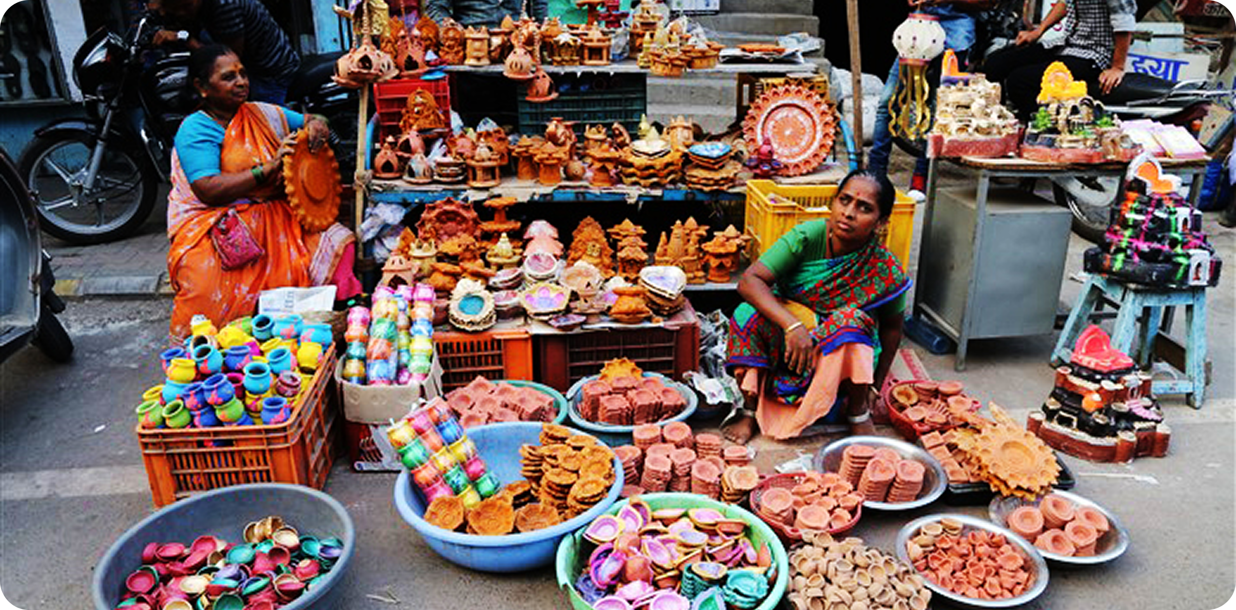 A woman selling diyas during diwali